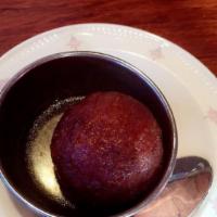 Gulab Jamun · Fried pastry bali soaked in rosewater syrup.