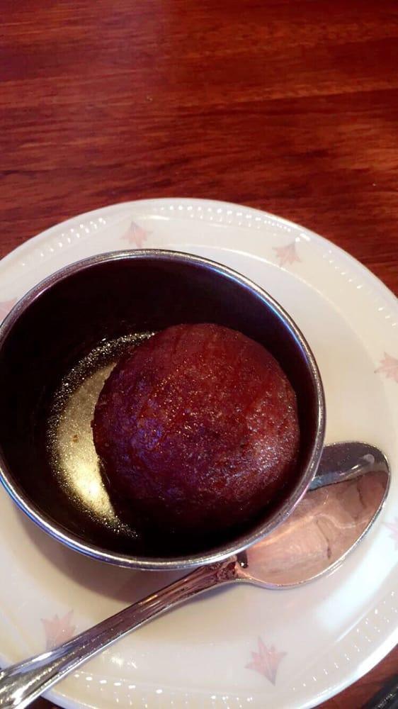 Gulab Jamun · Fried pastry bali soaked in rosewater syrup.