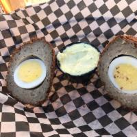 Scotch Egg · Hard-boiled egg wrapped in English sausage and served with mustard aioli. British specialty.