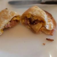 Breakfast Chorizo Empanada · Mild Italian sausage, eggs, potatoes, cheddar cheese and a blend of spices.g