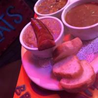 Taste of New Orleans · Gumbo, crawfish etouffee, red beans and rice with smoked sausage.