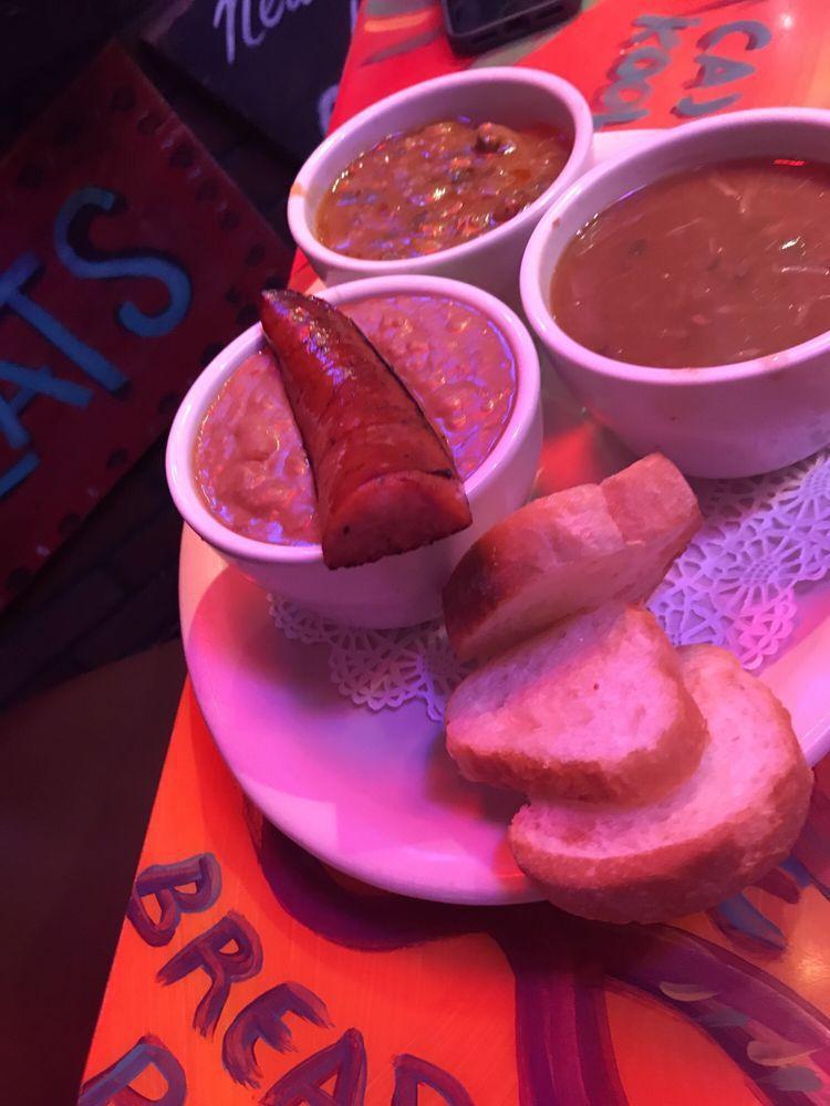 Taste of New Orleans · Gumbo, crawfish etouffee, red beans and rice with smoked sausage.