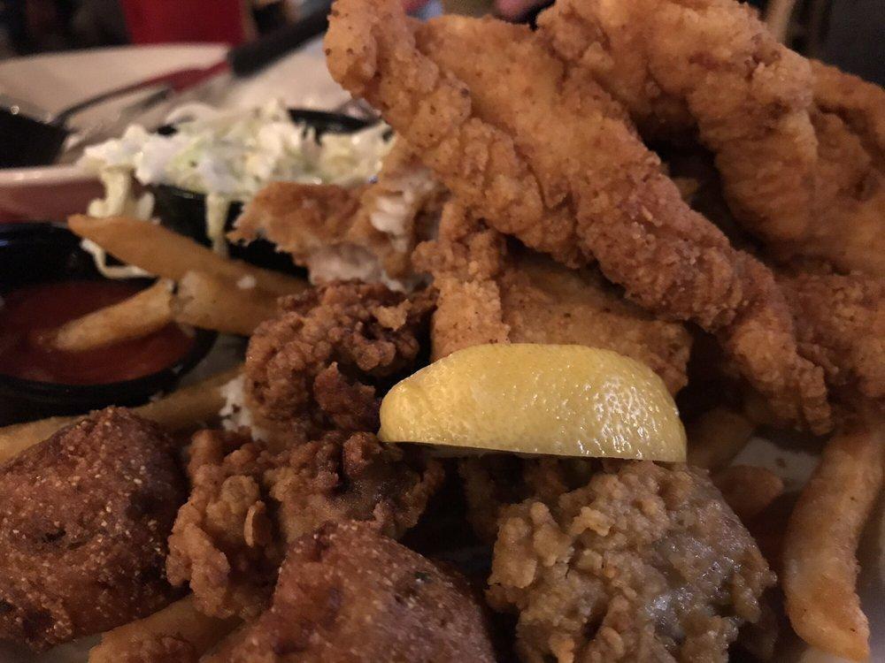 Fried Seafood Platter · Seasoned golden fried oysters, shrimp and crispy catfish piled high. Pair it with an abita beer, Louisiana brewed.