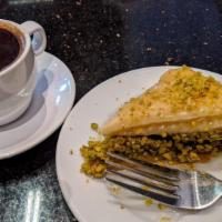 Baklava · Flaky thin layers of filo pastry, stuffed with chopped pistachios, topped with rose water sy...