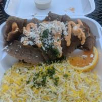 Gyro Plate · Gyro meat (lamb and beef mixture) on a bed of lettuce, topped with feta cheese and spicy gar...