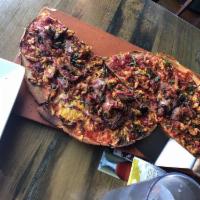 BBQ Chicken Pizza · Free range, hormone, and pesticide-free chicken and house-made BBQ sauce with roasted red on...