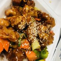 Sesame Chicken · Served in a sweet sauce served with sesame seeds. Spicy.