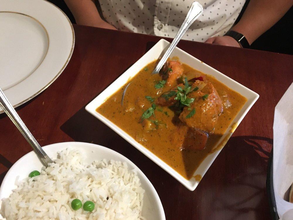 Chicken Tikka Masala · White chicken marinated, grilled and cooked in a light creamy sauce. Served with basmati rice.