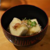 Agedashi Tofu · Crispy fried tofu served in dashi broth, topped with green onion and bonito.
