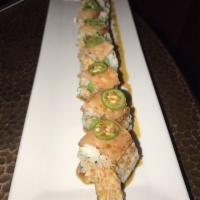 Crouching Tiger Signature Roll · Tempura shrimp, crab, topped with Cajun salmon, serrano, spicy ponzu (raw and mixed roll).
