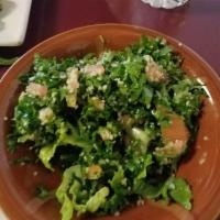Tabbouleh Salad · Bulgar, tomatoes, parsley, olive oil, lemon and lettuce.