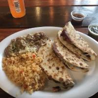 Quesadilla Platter with Meat · Choose with meat. Served with Spanish rice and refried beans.