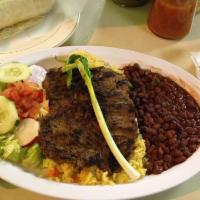 Carne Asada · Grilled steak. Served with rice, beans, salad and 2 tortillas.
