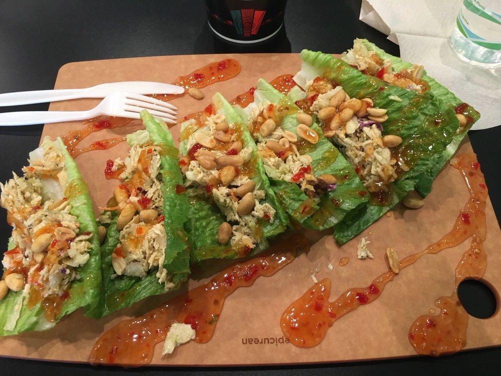 Coconut Chicken Lettuce Wrap · Romaine hearts, coconut chicken, tomato, almonds, red onions, Swiss cheese, drizzled with raspberry vinaigrette and ranch dressing.