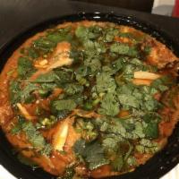 Chicken Karahi · Double portion. Thick gravy made with a traditional blend of spices and fresh tomatoes. (BES...