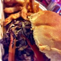 Cheesesteak · Our Thinly Sliced Hanger Steak, with Sauteed Onions, and Melted Cheddar Cheese. Served as Gy...