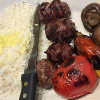 Beef Tenderloin Shish Kabob · A skewer of choice rolled beef tenderloin, cooked over an open flame. Served with lentil ric...