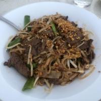 Pad Thai · Stir-fried Rice noodle with Tamarind sauce, Bean sprouts, Green onions, Egg, and Ground pean...