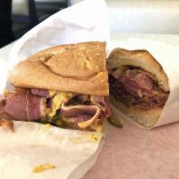 Pastrami Sandwich · Swiss cheese, mustard, and pickles on grilled sourdough.