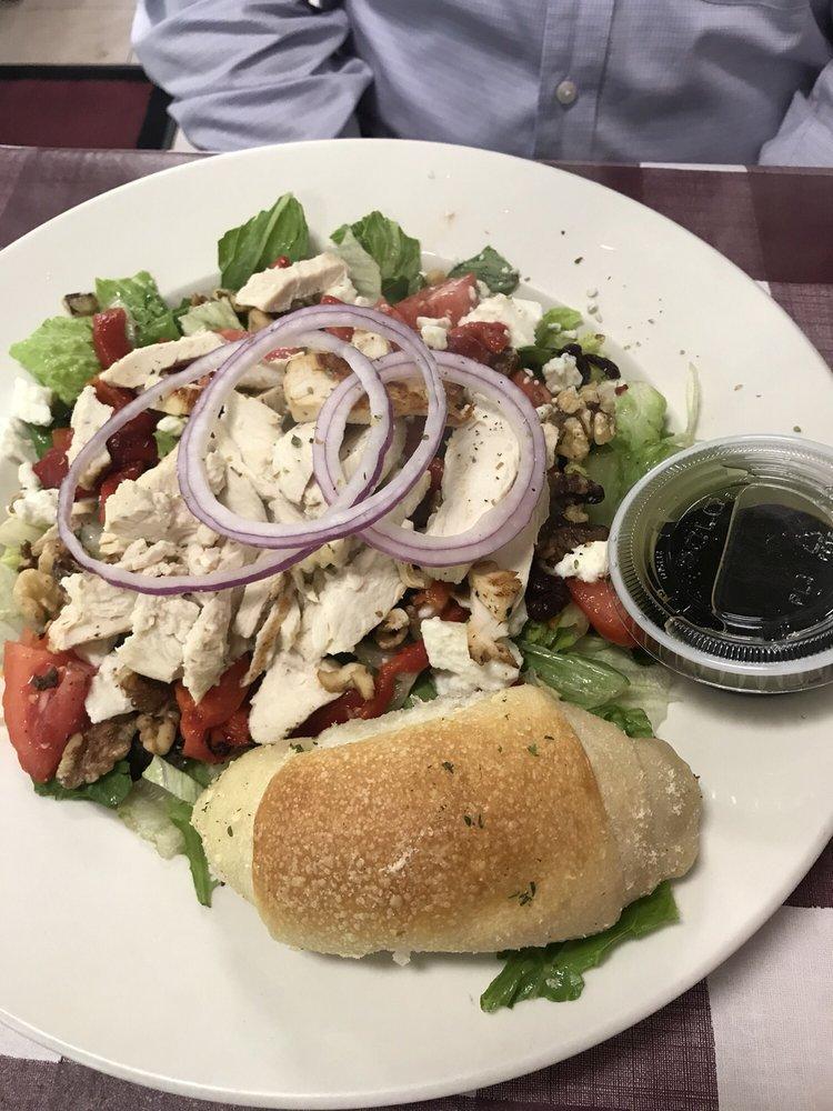 Tuscan Salad · Mixed greens, tomatoes, walnuts, cranberries, onion, roasted red peppers, fresh mozzarella, and Gorgonzola cheese with balsamic vinaigrette.