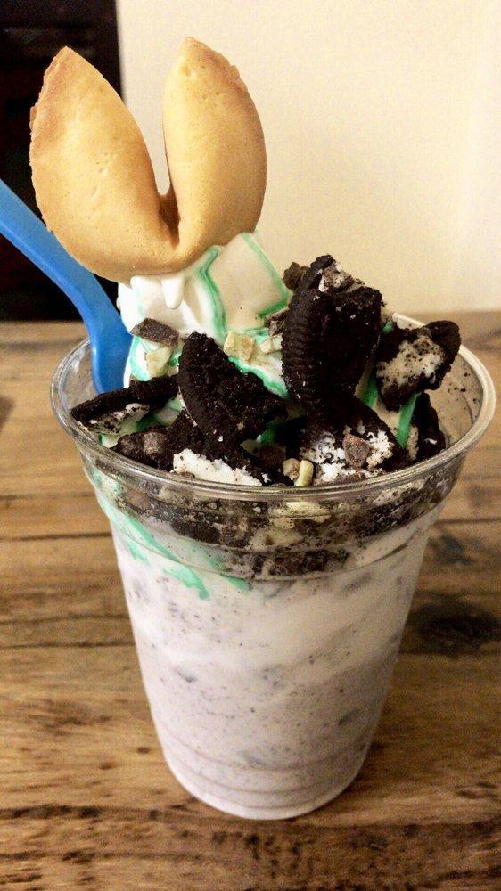 Crater Lake · Vanilla soft serve, cookies and creme crumble, andes mints, chocolate chips, cool mint flavor burst and trivia cookie.