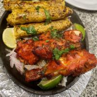 Mixed Grill · 3 pieces chicken boti, 1 piece chicken seekh, 1 piece lamb kabab, 1 beef for chicken kabab a...