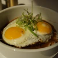 Loco Moco Bowl · Steamed white rice, house made beef patty, house brown gravy, two sunny side up eggs, and gr...