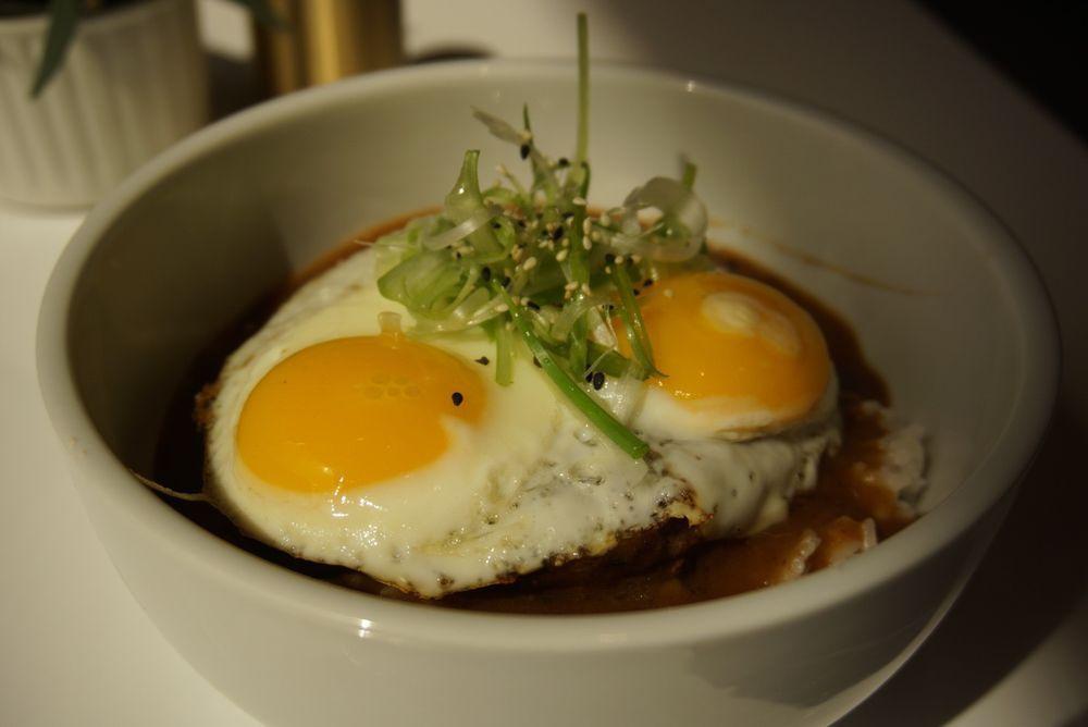 Loco Moco Bowl · Steamed white rice, house made beef patty, house brown gravy, two sunny side up eggs, and green onions.