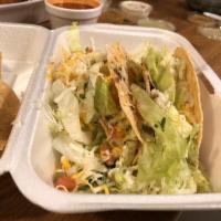 Hard Shell Tacos · Meat, lettuce, pico de gallo and cheddar cheese. Served with onions and cilantro.