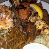 Lamb Souvlaki · Medallions of lamb, seasoned with with olive oil and our special blend of Greek spices, skew...