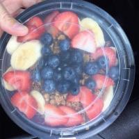 Acai Bowl · Unsweetened organic acai, blueberries, strawberries & banana blended with OJ, topped with ho...
