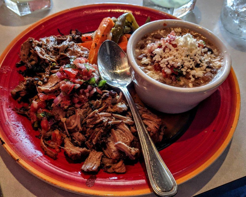 Carnitas · Slow roasted Berkshire pork, served with rice, pico, escabeche tortillas on request.