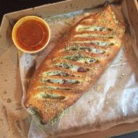 The Works Stromboli · Italian sausage, pepperoni, green peppers, mushrooms, onions and black olives.