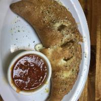 Cheese Calzone · Add toppings for an additional charge.