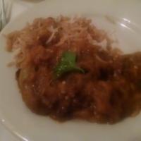 Lamb Stew · Gemeh. Mildly seasoned chunks of lamb mixed with split peas, simmered and cooked in gravy. I...