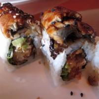 Dragon Roll · Soft shell crab, green onion, spicy mayo, avocado, topped with eel and eel sauce.