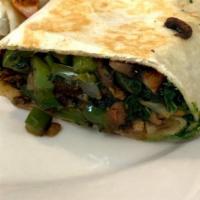 Veggie Wrap · Served with spinach, tomato, onions, mushrooms, and peppers.