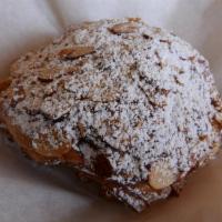 Chocolate Almond Croissant · Our traditional Croissant dough filled with scratch-made Almond paste, Cacao Barry Chocolate...