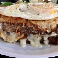 Croque Madame · Ham, Swiss and Béchamel with a dash of mustard on Country Bread topped with an egg