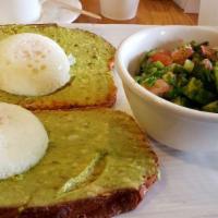 Avocado Toast · Fresh avocado spread on top of sourdough toast, with celery salt and served with poached eggs.