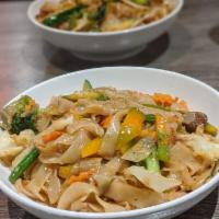 Drunken Noodles · Flat rice noodles with bell peppers, onion, broccoli, bean sprouts, basil.