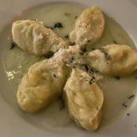 Culurgiones · Sardinian ravioli stuffed with a potato filling flavored with fresh mint leaves, pecorino ch...