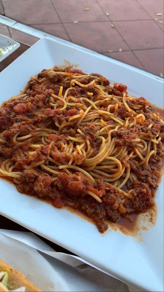 Spaghetti · Choice of our classic meat or marinara sauce. Includes garlic bread  and Small garden salad.