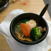 Wonton Soup · Wontons, shrimp, white chicken, broccoli, carrots, water chestnuts, and mushrooms.