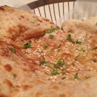 Onion Kulcha · Scrumptious unleavened bread stuffed with onions and spices.