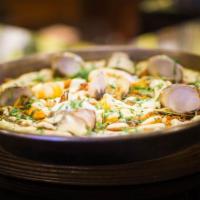 Seafood Paella · Serves 4 person, seafood combination.