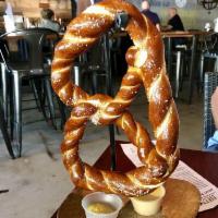 Giant Bavarian Pretzel · Served with beer cheese fondue and whole grain mustard.