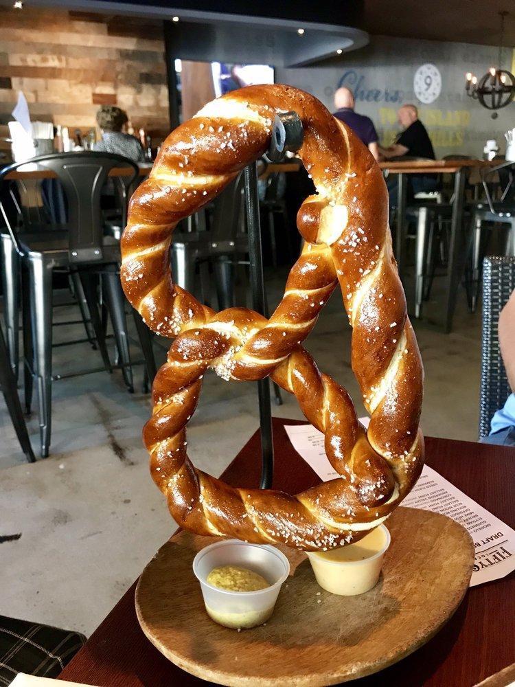 Giant Bavarian Pretzel · Served with beer cheese fondue and whole grain mustard.
