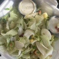 Cobb Salad · Shredded iceberg lettuce, egg, bacon, avocado, green onions, tomatoes, Gorgonzola, blue chee...
