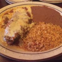 Chile Rellenos · 1 poblano pepper stuffed with seasoned ground beef, then covered in spicy ranchero cance and...